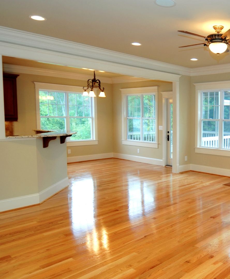 Freshly polished timber floor in a sunlit room